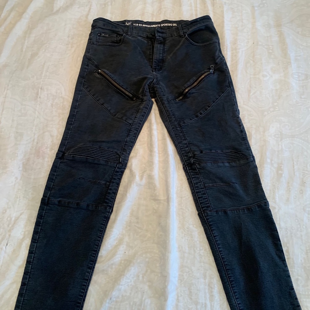 Versace black jeans.